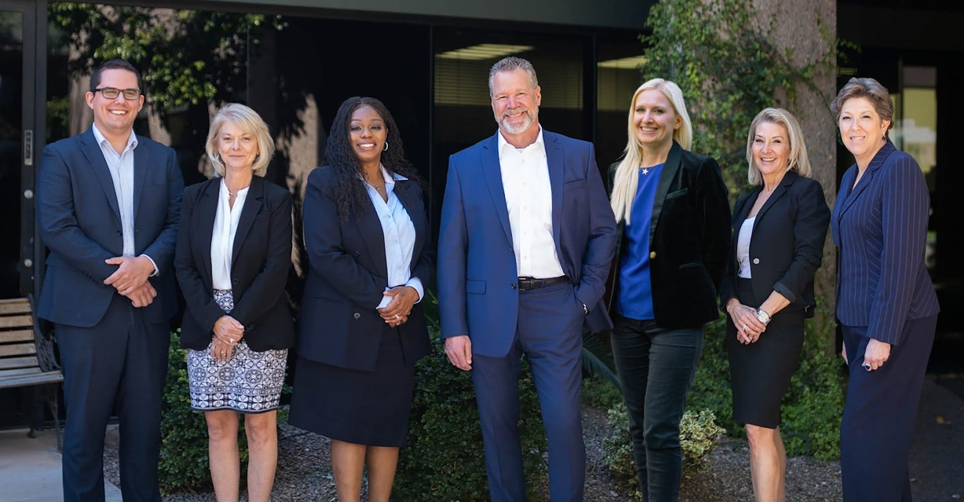 Business professionals discussing hiring solutions with staffing agency experts.